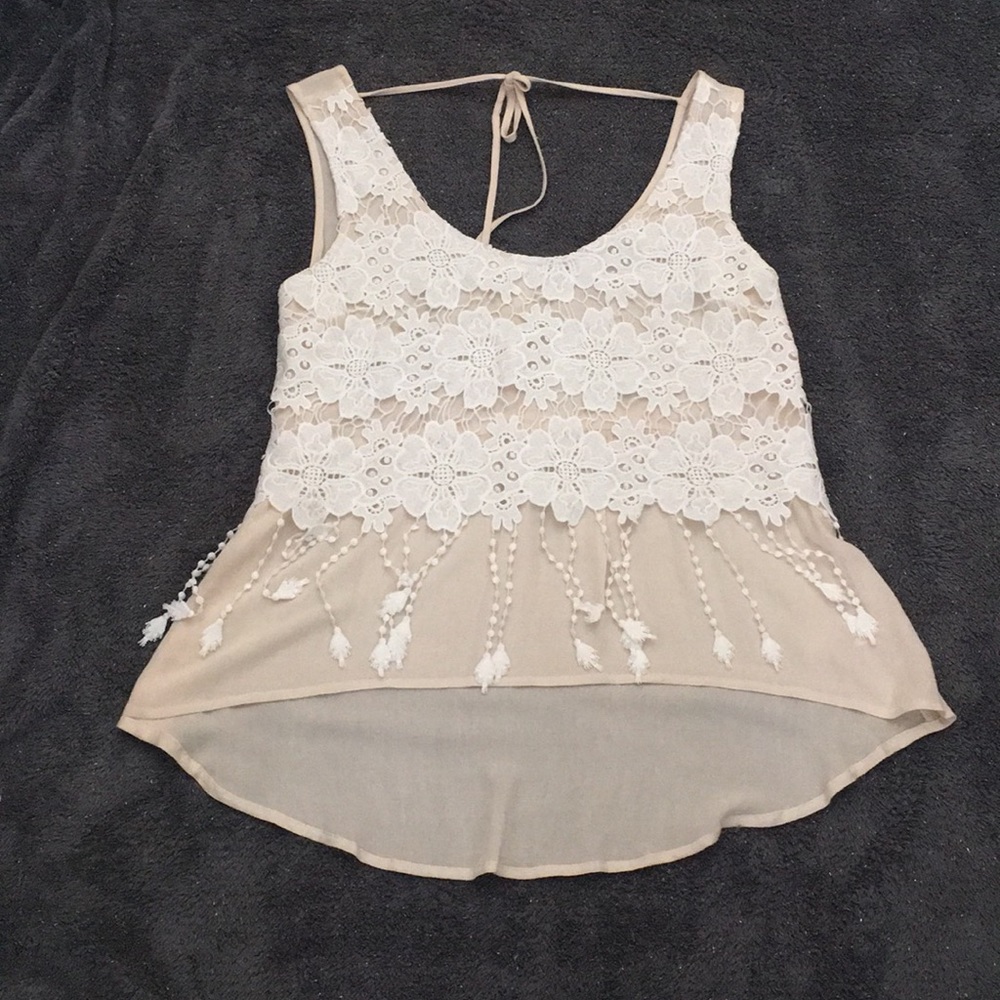 Hi-low tank top with chiffon and lace. Fits like a babydoll item.